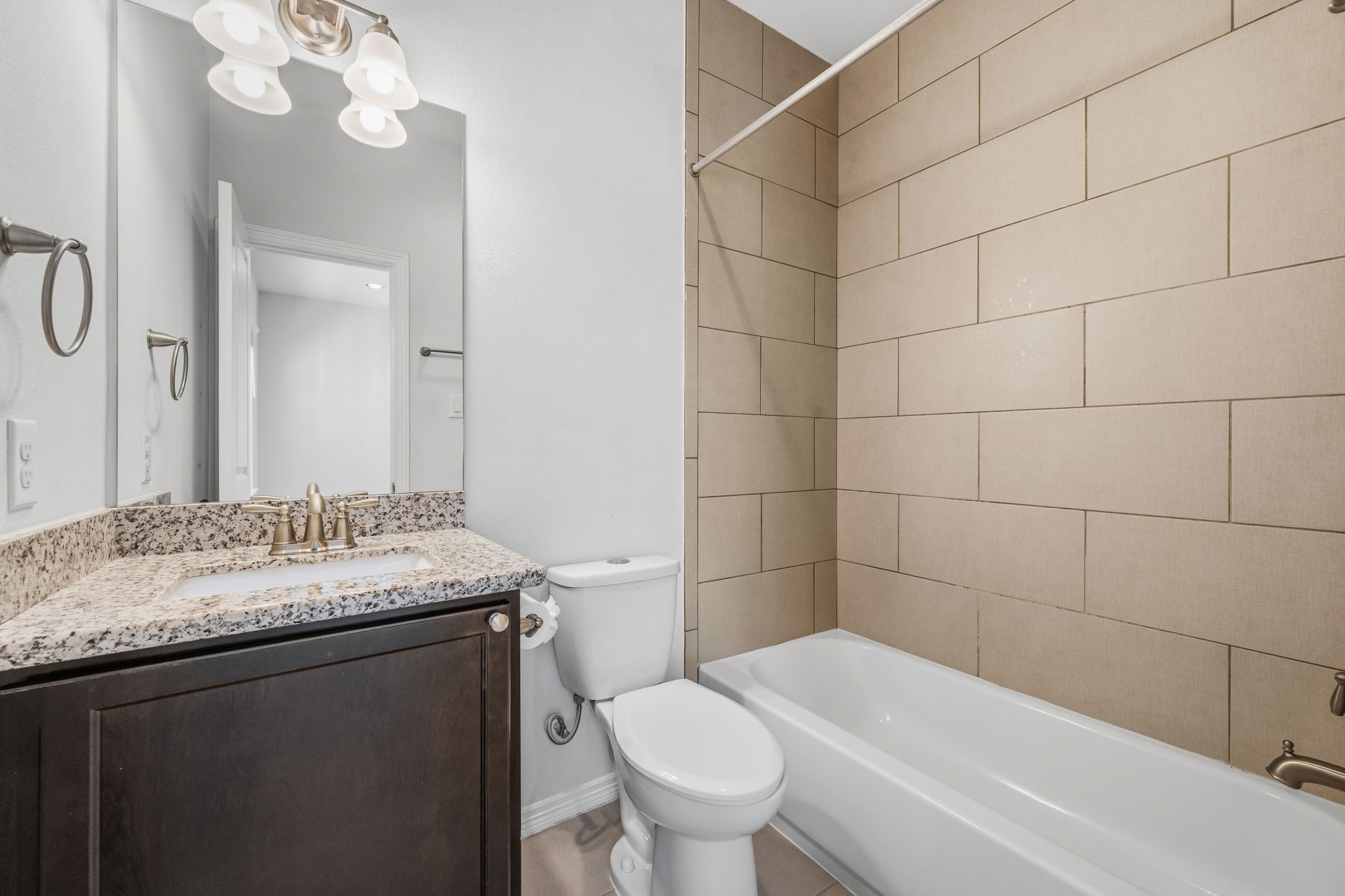 617 West 24th Street Houston, TX 77008 - Photo 18 of 28 a bathroom with a sink a toilet and shower