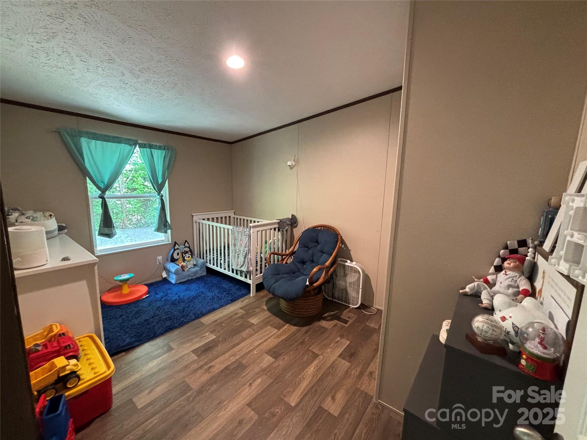 2877 Shannon Street Sharon, SC 29742 - Photo 24 of 29 a living room with furniture and a wooden floor