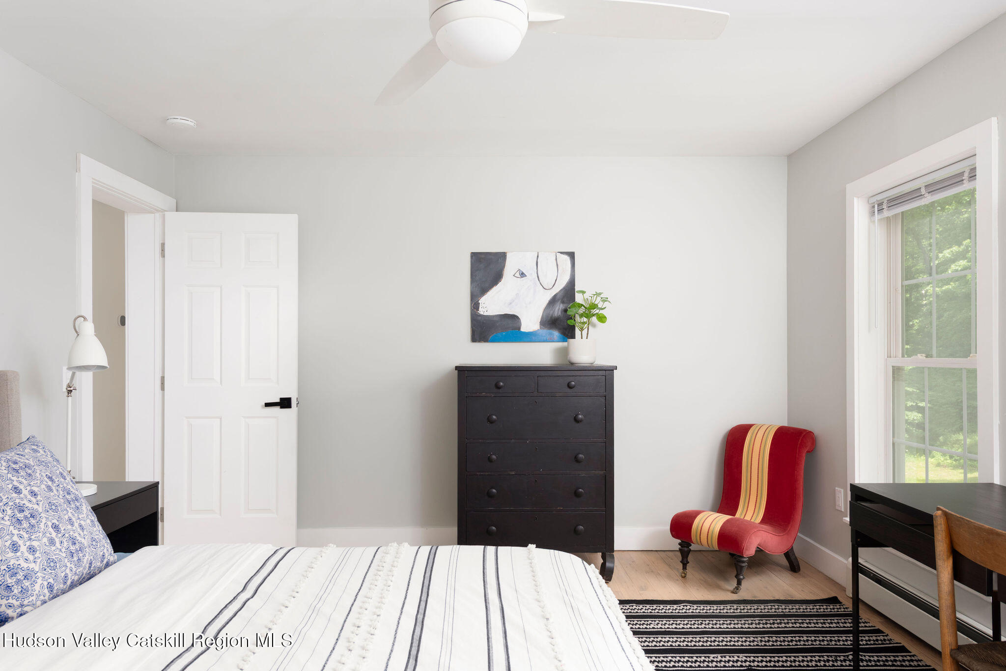 31 Laurel Hollow Road Kerhonkson, NY 12446 - Photo 22 of 47 a bedroom with a bed and a dresser