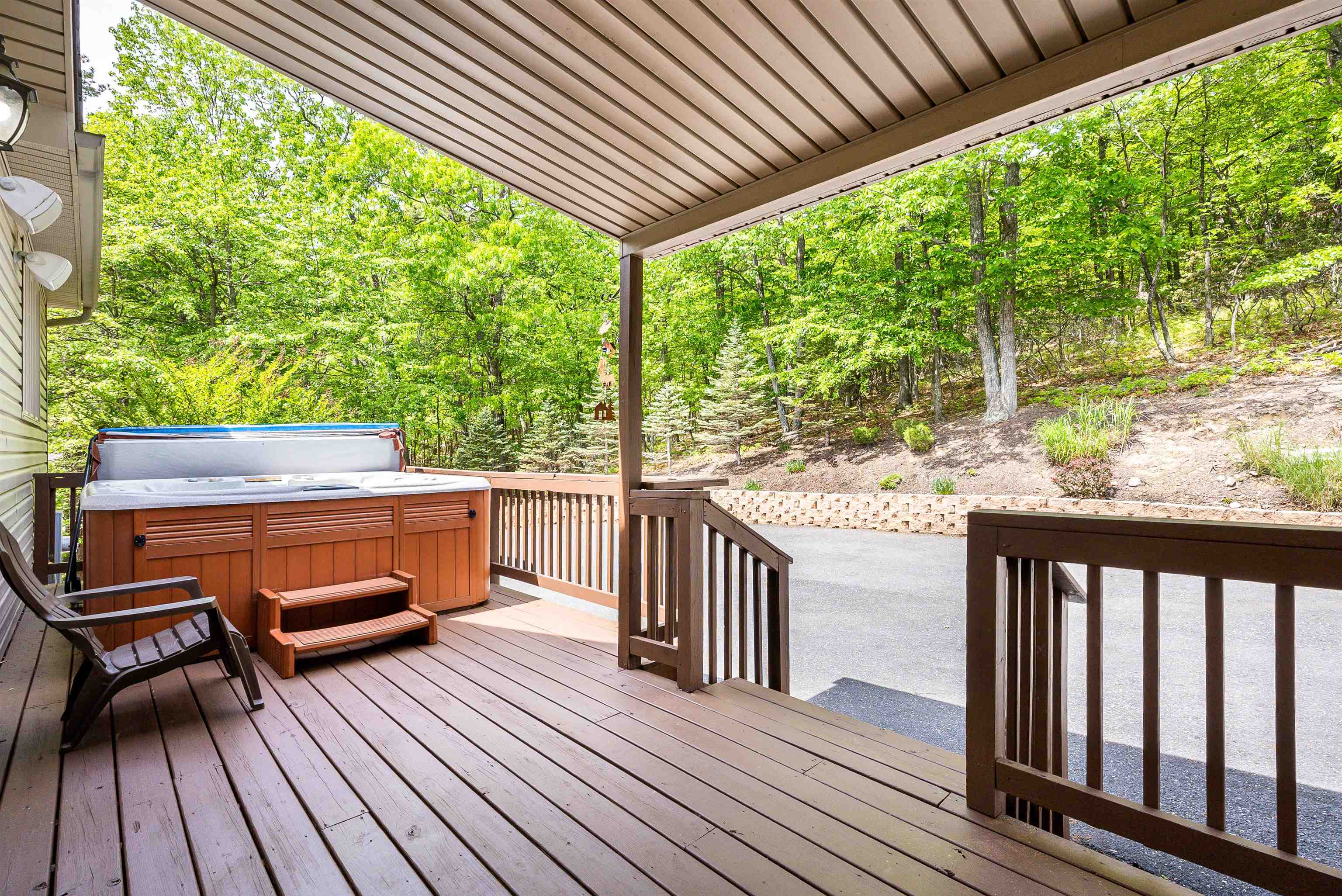 312 Rainier Road McGaheysville, VA 22840 - Photo 11 of 55 a view of a wooden deck with a bench