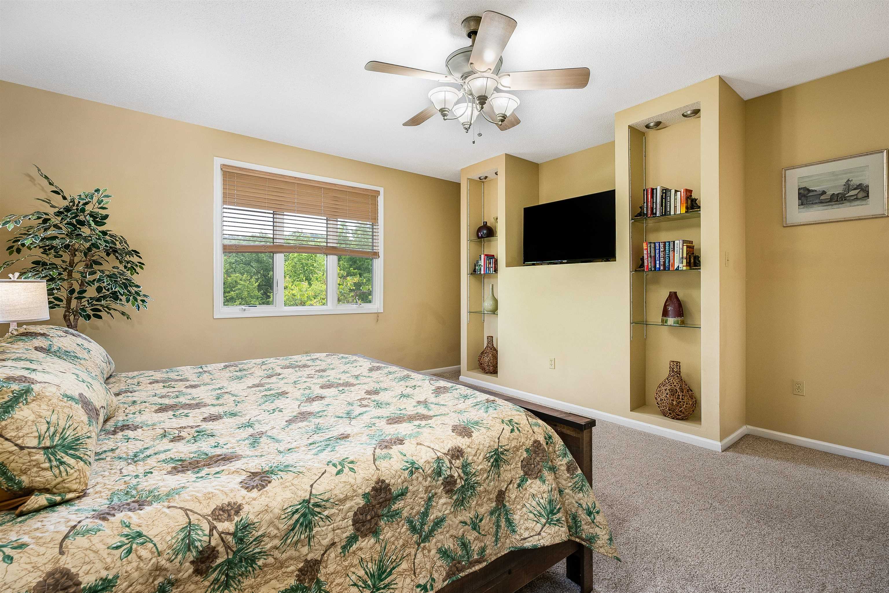 312 Rainier Road McGaheysville, VA 22840 - Photo 27 of 55 a bedroom with a bed and a window