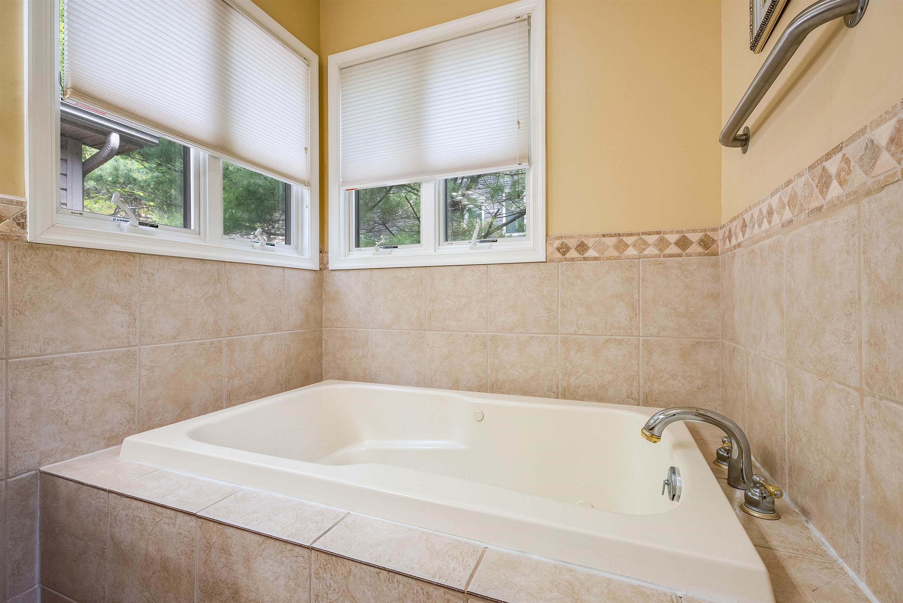 312 Rainier Road McGaheysville, VA 22840 - Photo 30 of 55 a white bath tub sitting next to a window