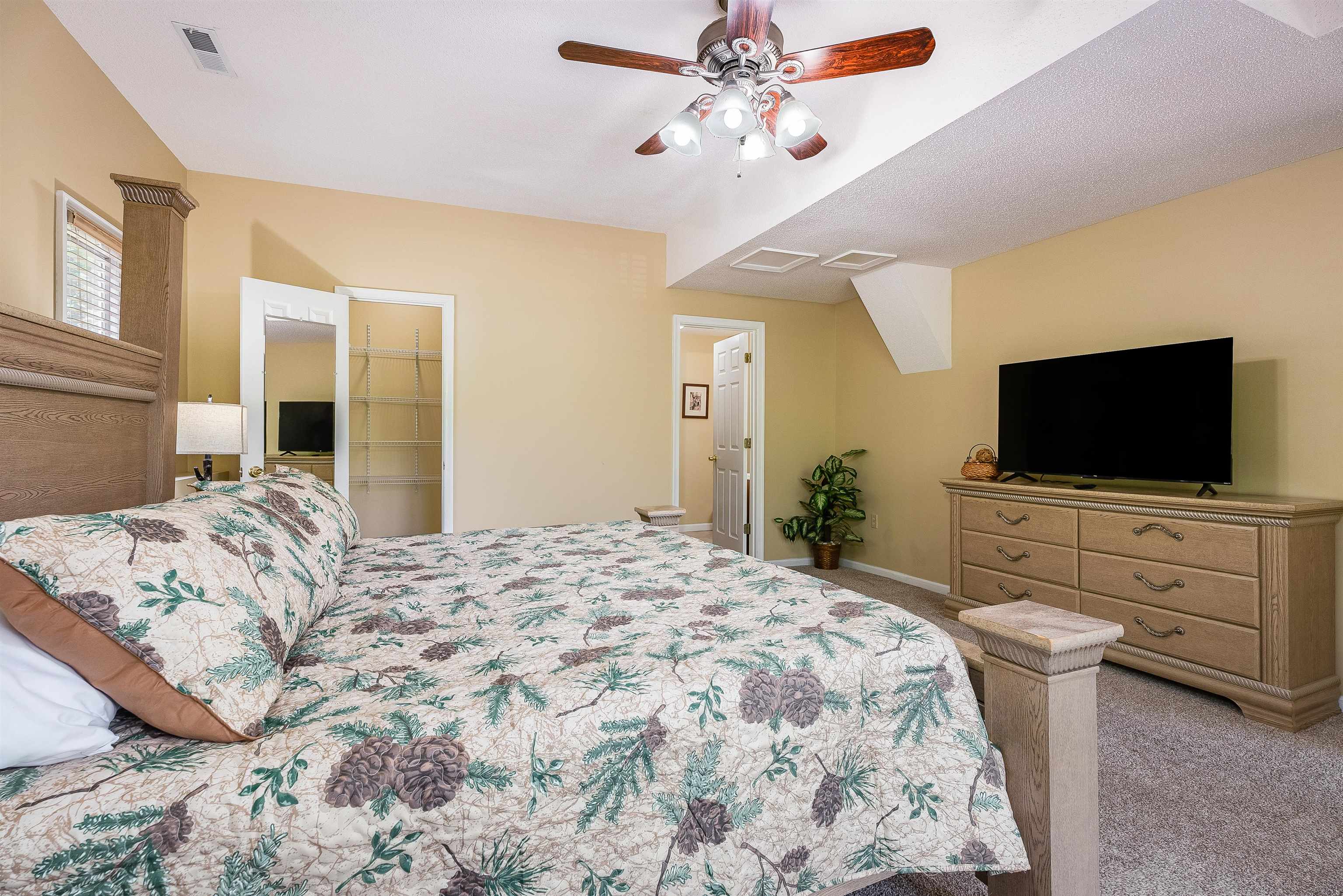 312 Rainier Road McGaheysville, VA 22840 - Photo 45 of 55 a bedroom with a bed and a flat screen tv