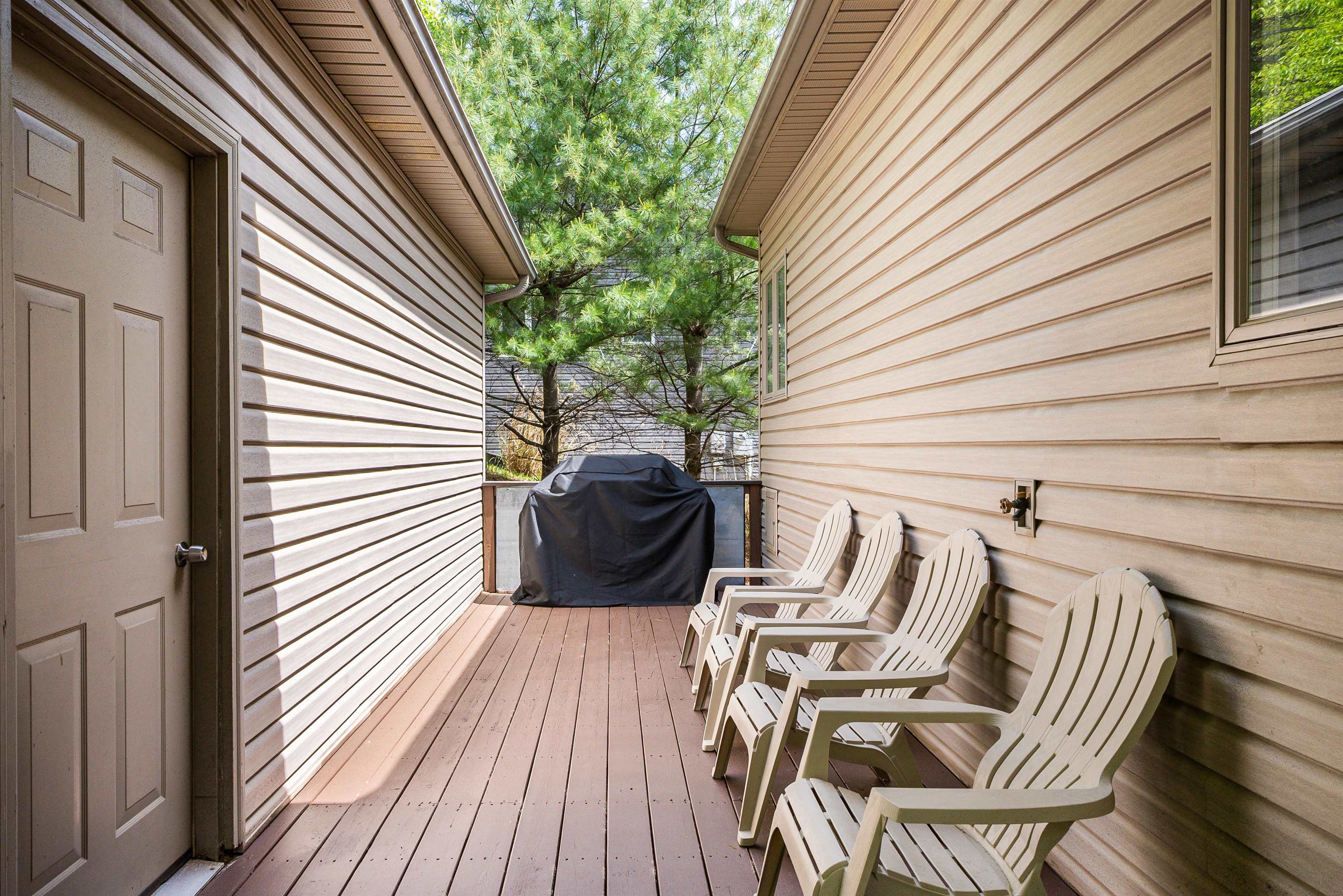 312 Rainier Road McGaheysville, VA 22840 - Photo 10 of 55 a view of a patio with wooden chairs