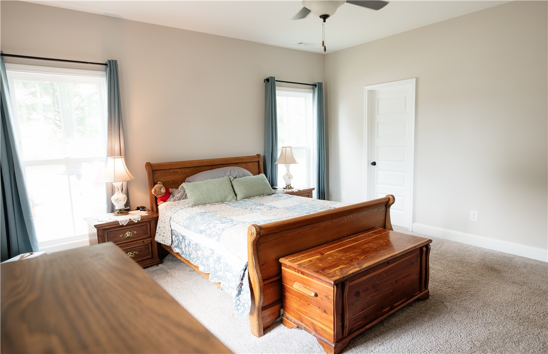 116 Public Well Road Anderson, SC 29626 - Photo 8 of 19 This spacious bedroom offers ample natural light and a comfortable atmosphere.