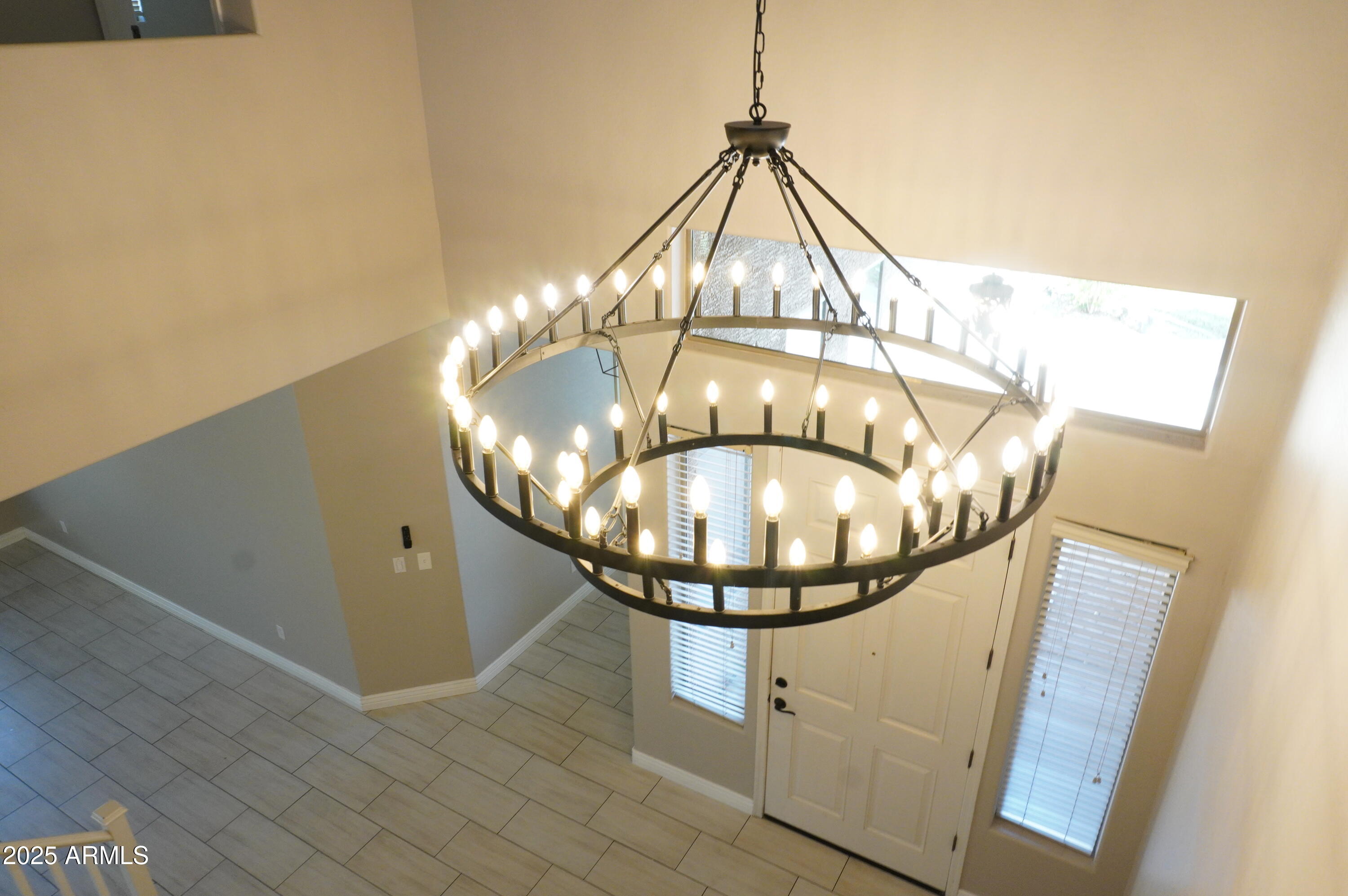 6700 South Agate Way Chandler, AZ 85249 - Photo 16 of 32 a view of a chandelier in a room