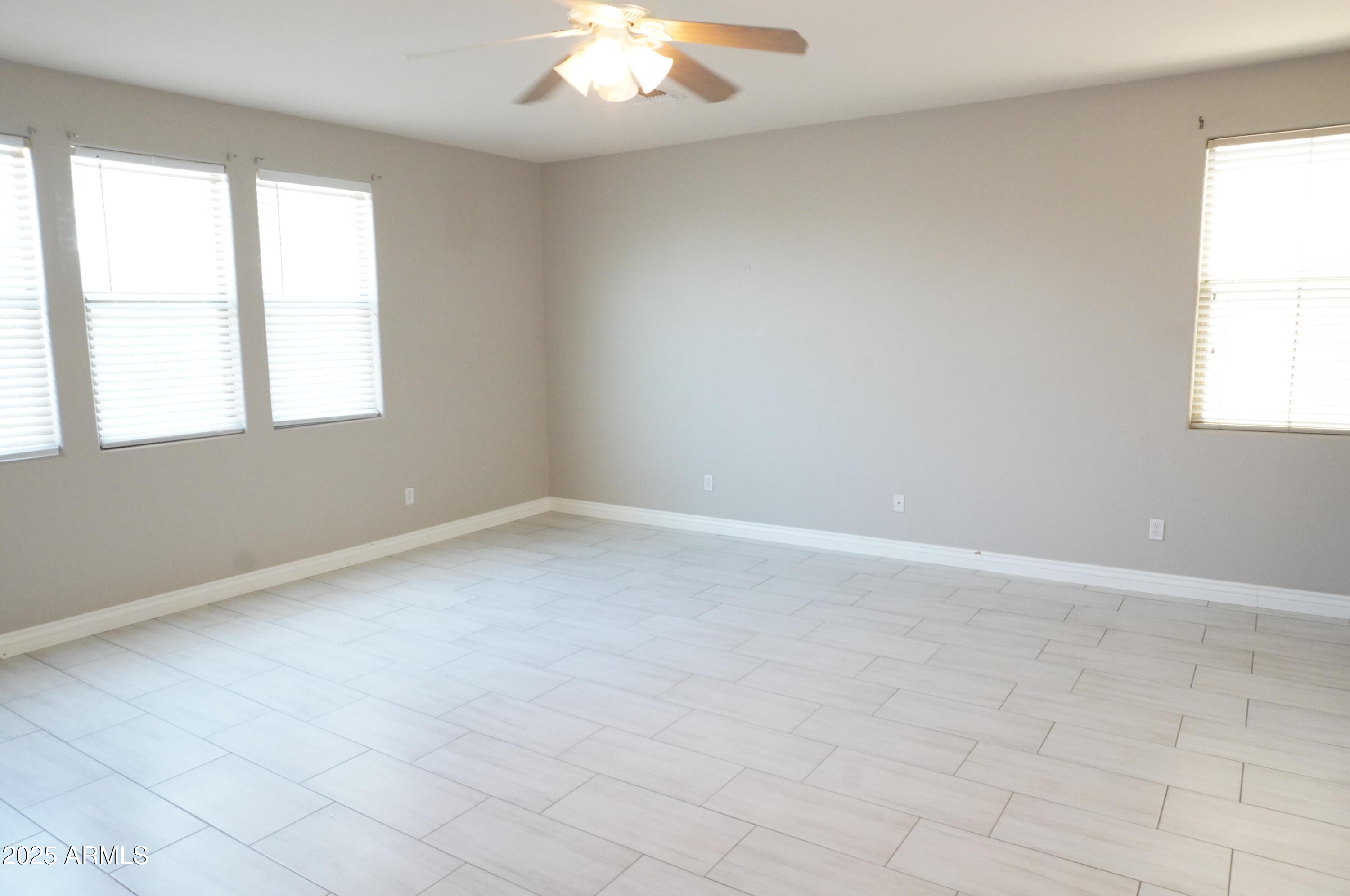 6700 South Agate Way Chandler, AZ 85249 - Photo 18 of 32 an empty room with a window