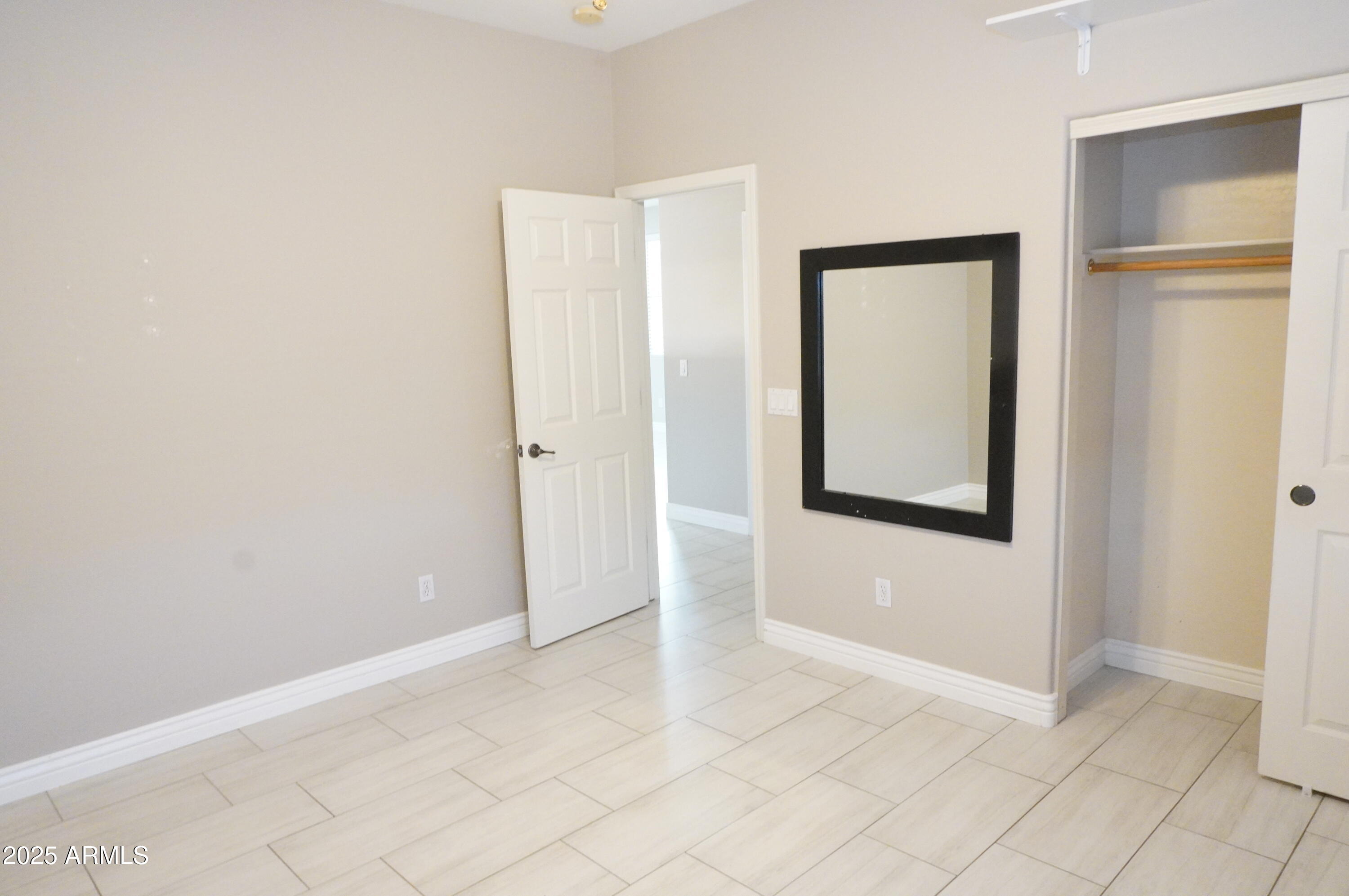 6700 South Agate Way Chandler, AZ 85249 - Photo 24 of 32 an empty room with windows