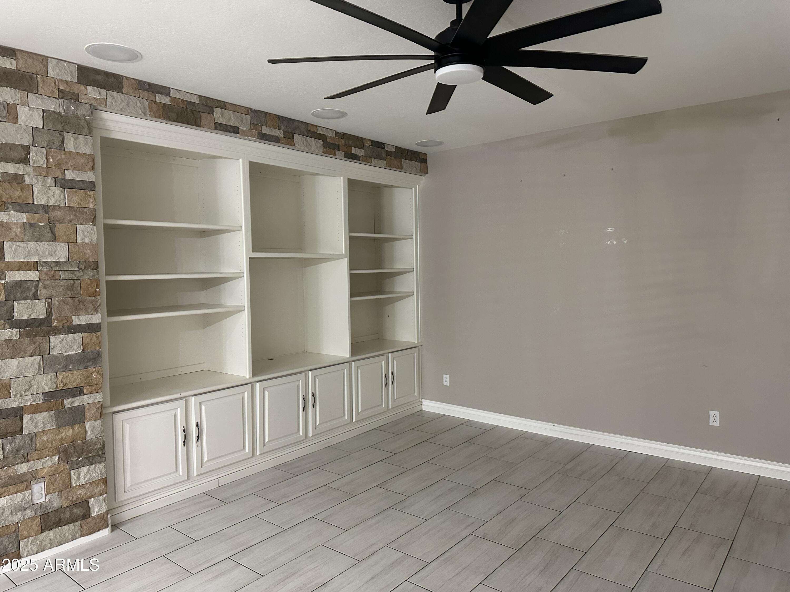 6700 South Agate Way Chandler, AZ 85249 - Photo 28 of 32 a view of an empty walk in closet