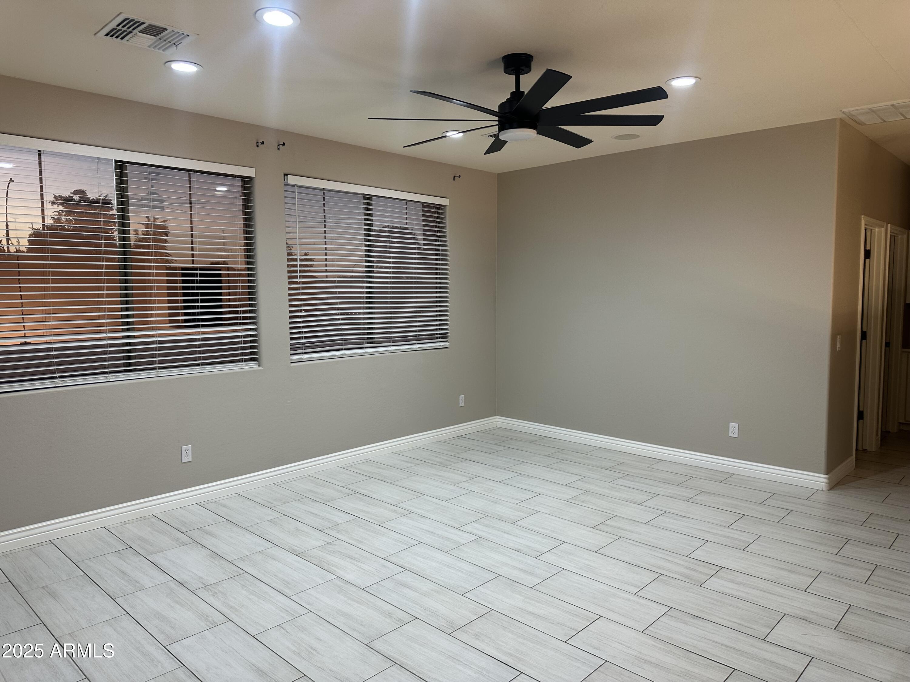 6700 South Agate Way Chandler, AZ 85249 - Photo 29 of 32 a view of an empty room with a window