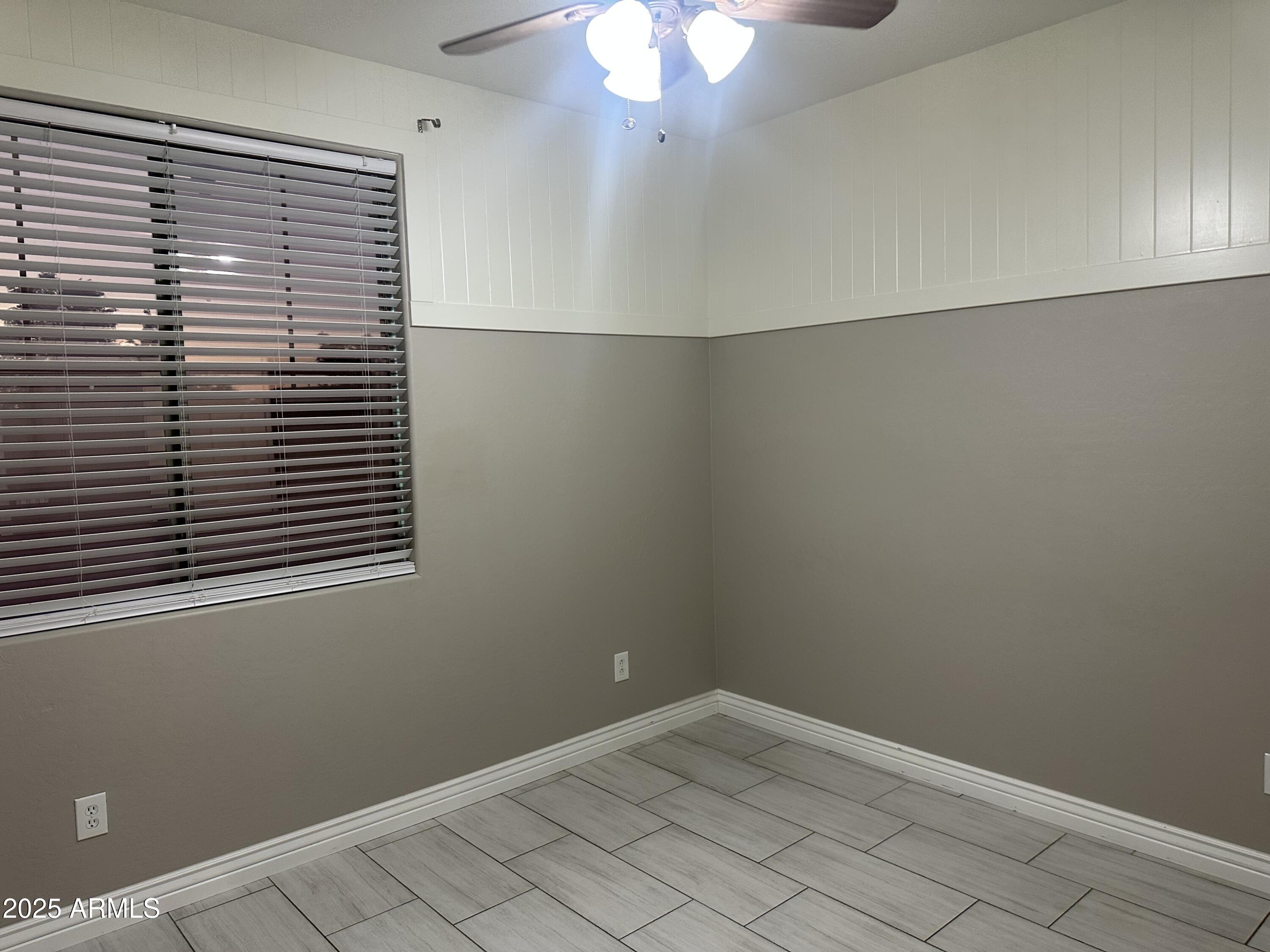 6700 South Agate Way Chandler, AZ 85249 - Photo 32 of 32 an empty room with a window