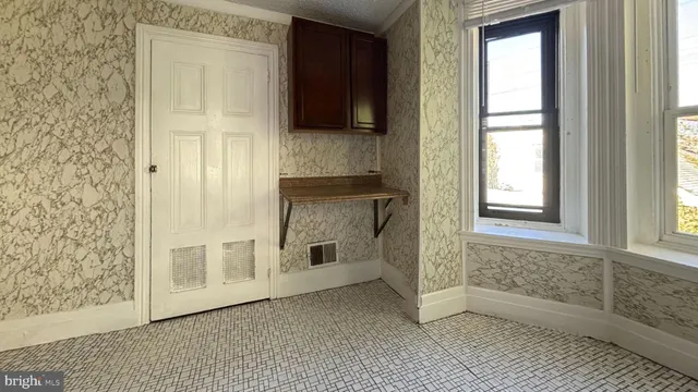 a view of an entryway with a window