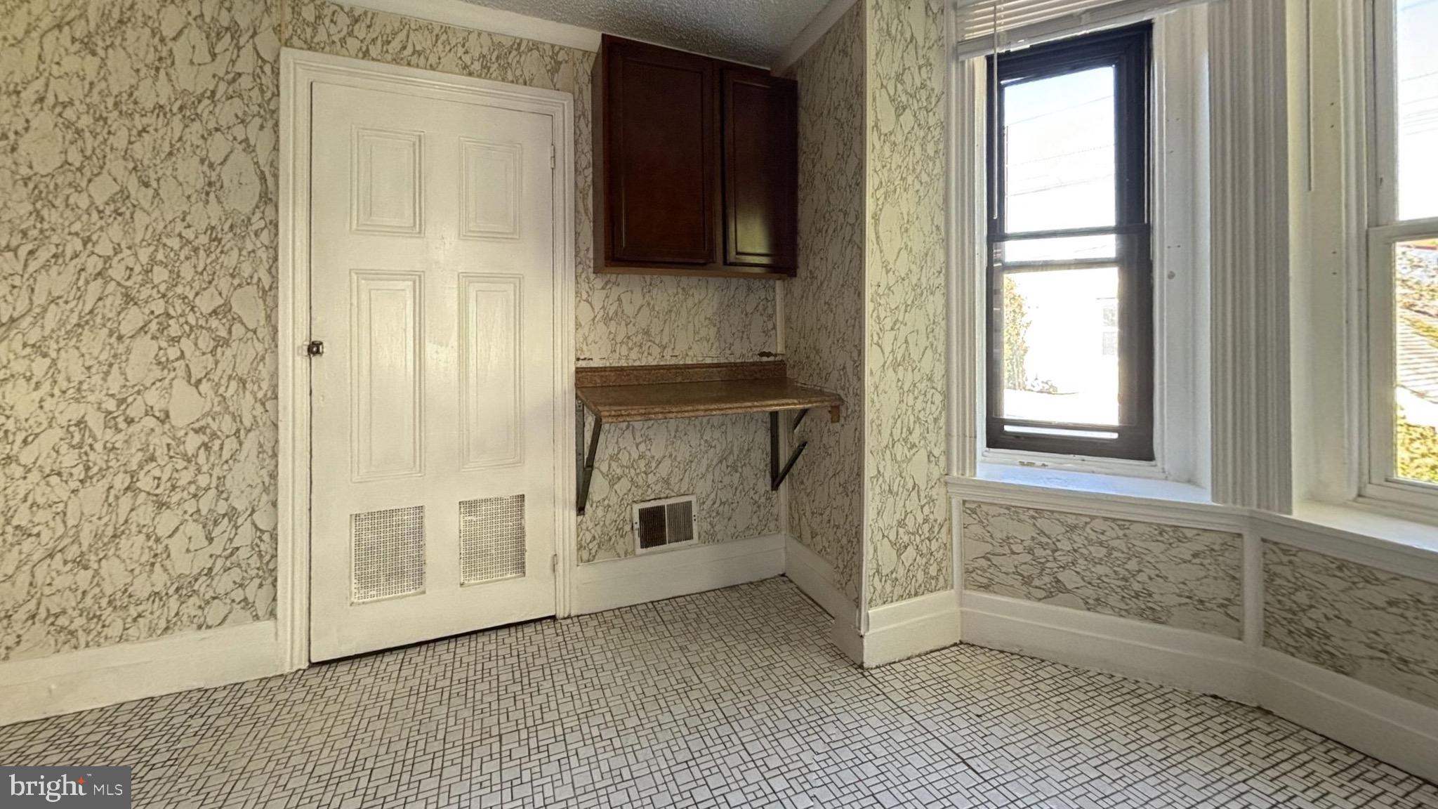 363 East Chelten Avenue, Unit 2 Philadelphia, PA 19144 - Photo 2 of 8 a view of an entryway with a window