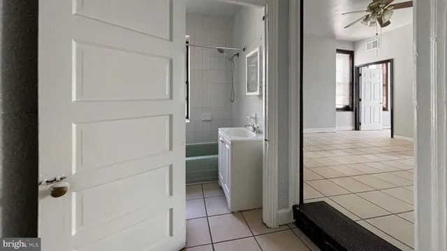 a bathroom with a shower and toilet