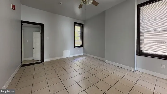 a view of an empty room and window