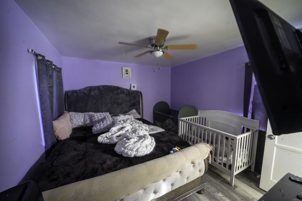 7513 Pivot Street Downey, CA 90241 - Photo 4 of 11 a living room with furniture and wooden floor