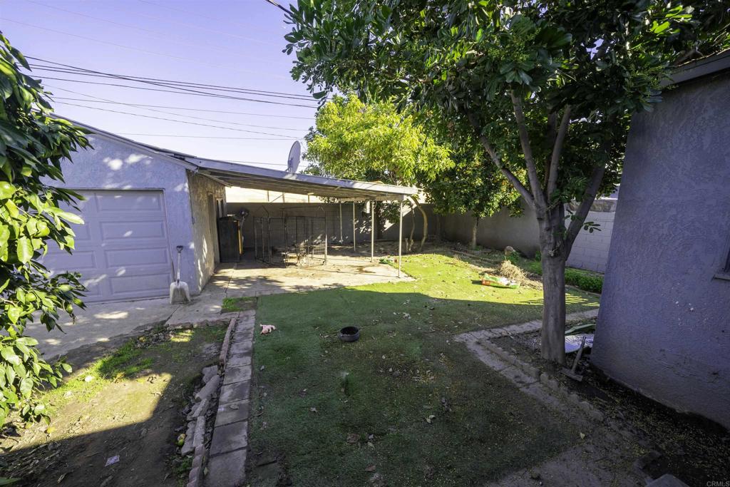 7513 Pivot Street Downey, CA 90241 - Photo 9 of 11 a view of a swimming pool with a patio