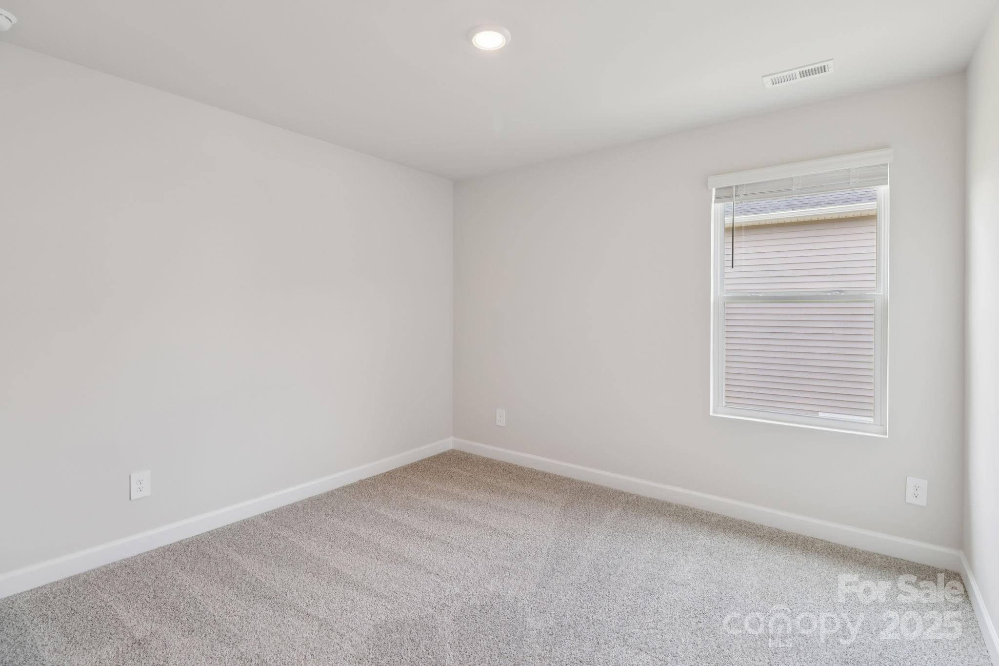 172 Murphy Mdw Road Mocksville, NC 27028 - Photo 17 of 22 an empty room with a window
