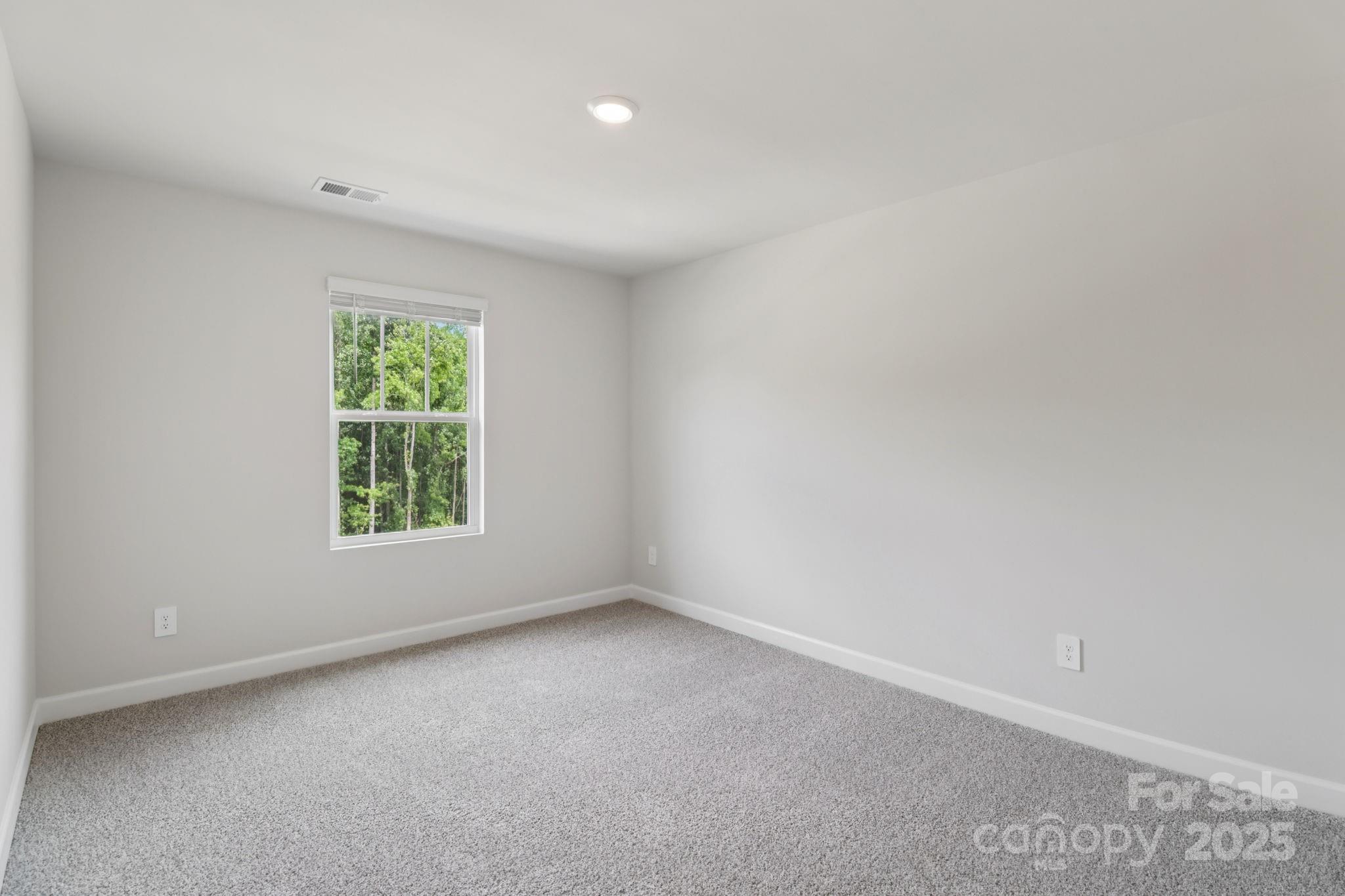 172 Murphy Mdw Road Mocksville, NC 27028 - Photo 9 of 22 an empty room with a window