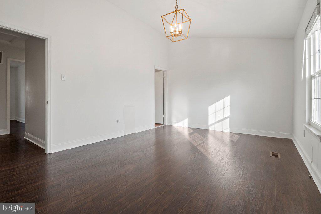 7472 Setting Sun Way Columbia, MD 21046 - Photo 24 of 40 a view of a room with wooden floor and window