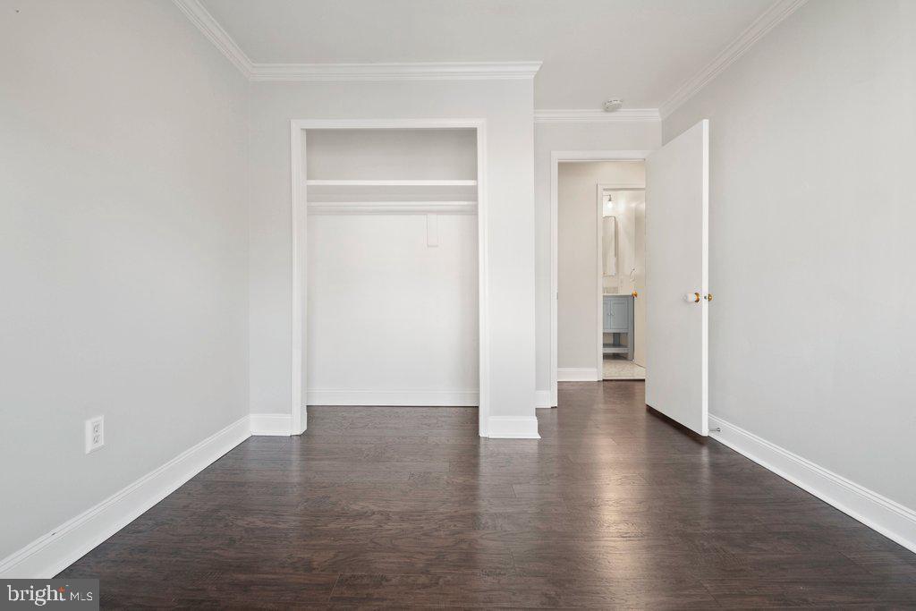 7472 Setting Sun Way Columbia, MD 21046 - Photo 29 of 40 a view of a hallway with wooden floor