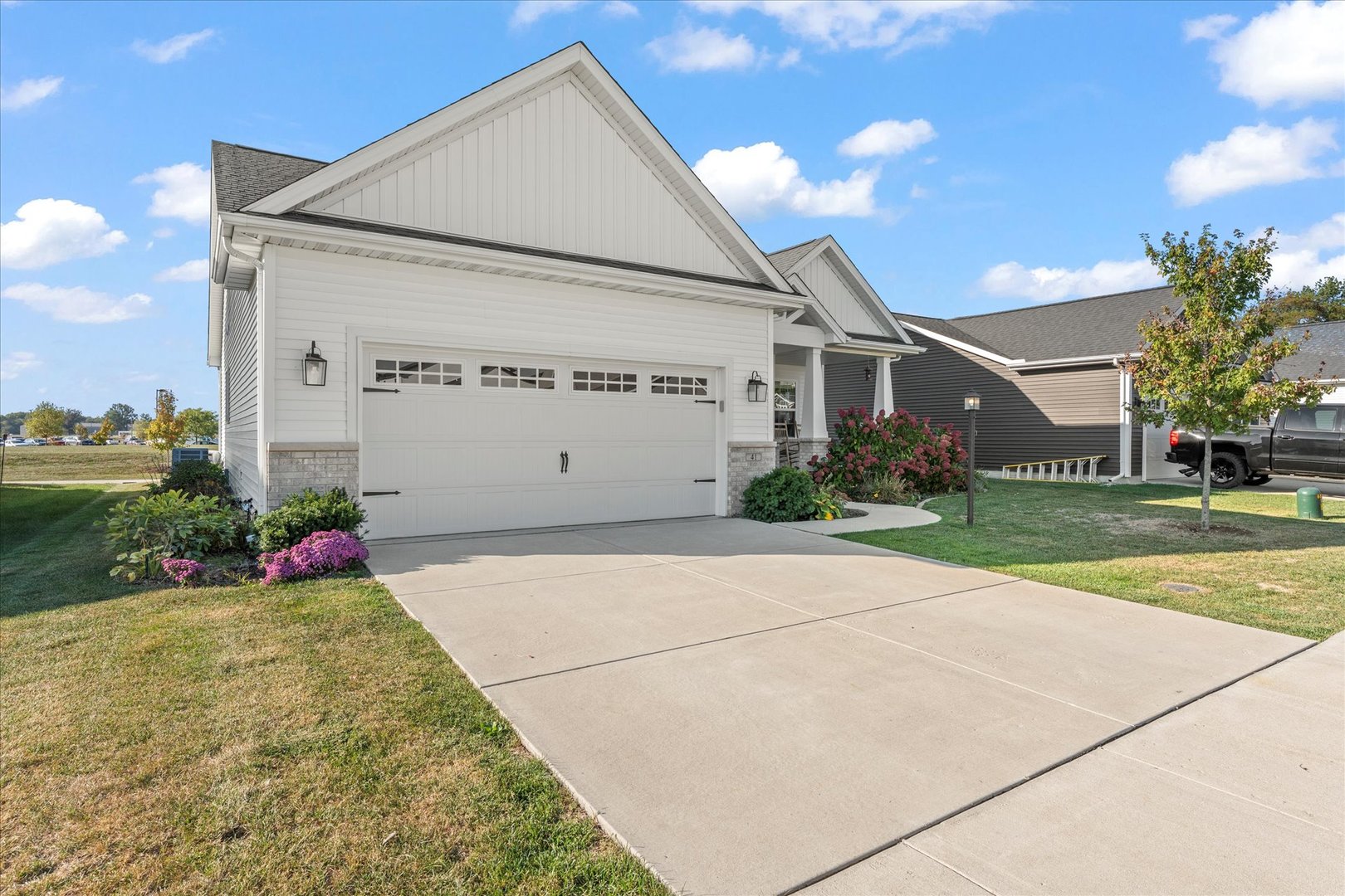 41 Lodge Trail Monticello, IL 61856 - Photo 3 of 3 a view of garage and yard
