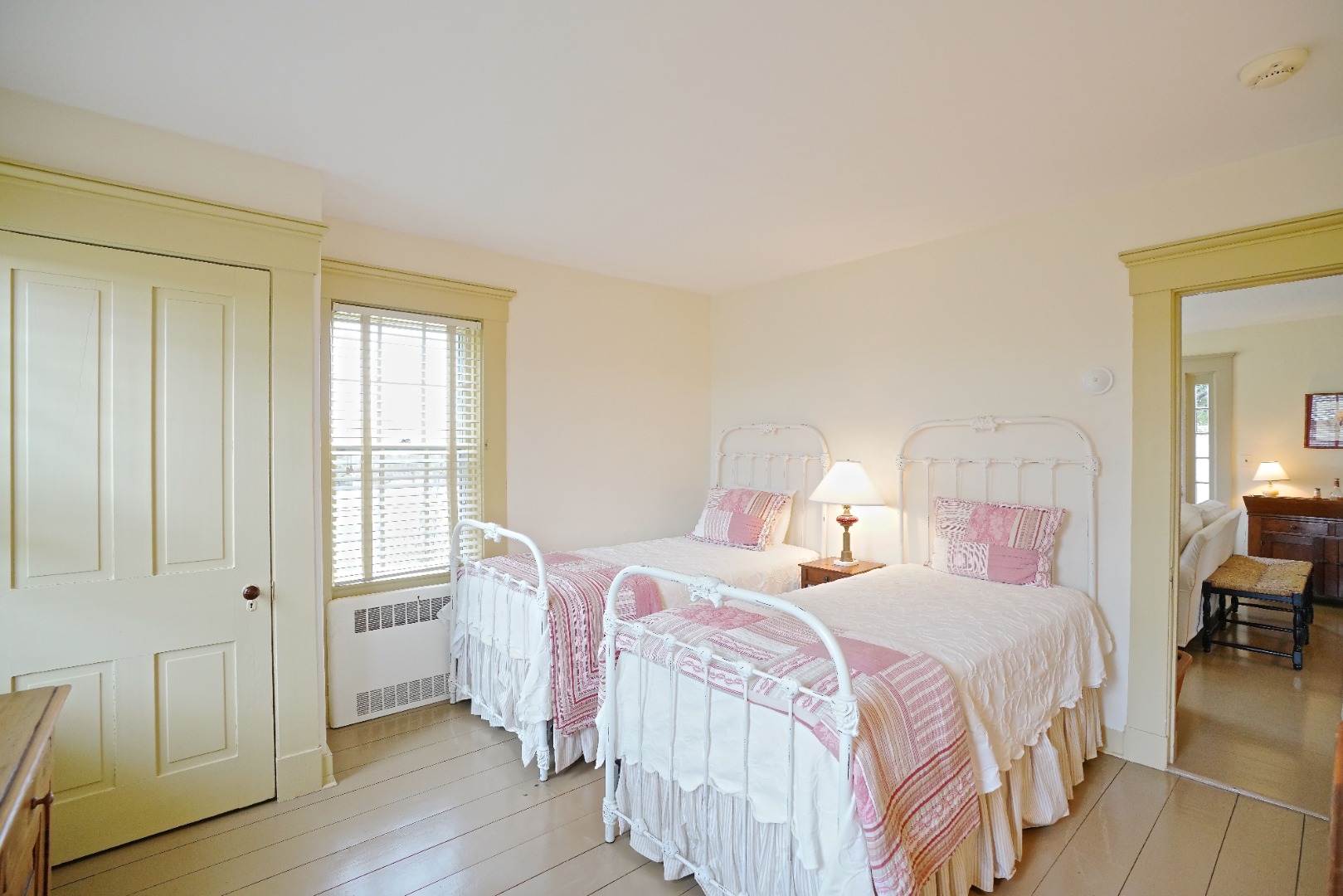 31 Butler's Cove Road Edgartown, MA 02539 - Photo 11 of 24 a bedroom with two beds and wooden floor