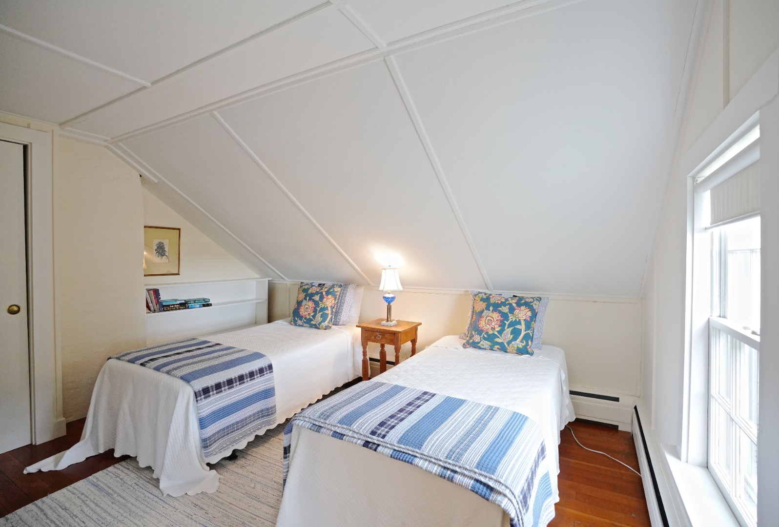 31 Butler's Cove Road Edgartown, MA 02539 - Photo 13 of 24 a bedroom with two beds and a window