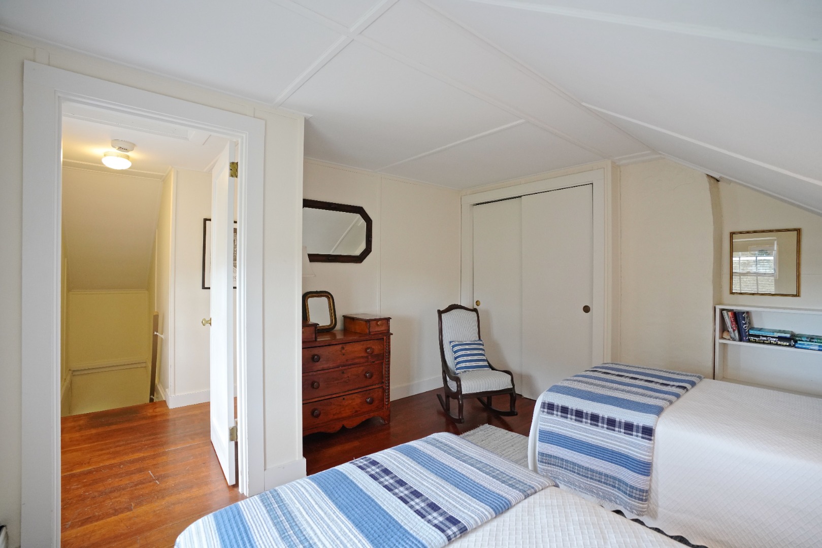 31 Butler's Cove Road Edgartown, MA 02539 - Photo 15 of 24 a bedroom with a bed and wooden floor