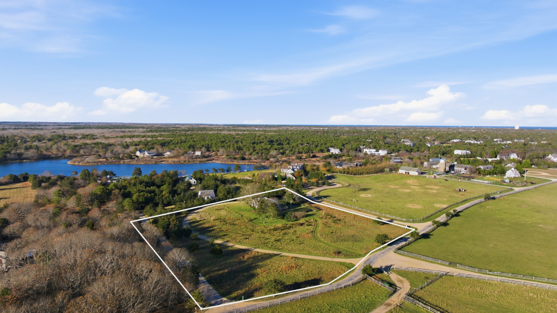 31 Butler's Cove Road Edgartown, MA 02539 - Photo 23 of 24 an aerial view of residential houses with outdoor space