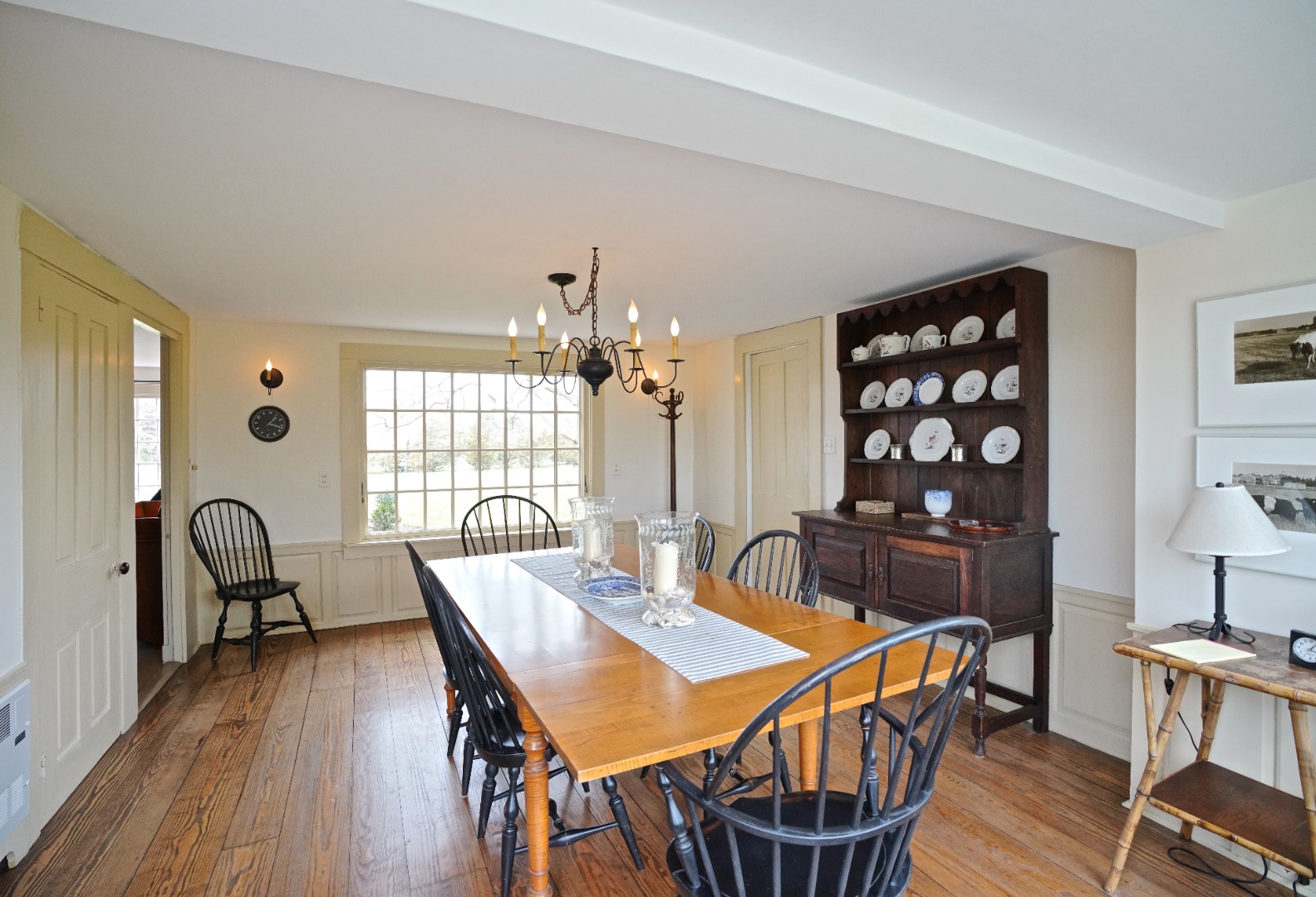 31 Butler's Cove Road Edgartown, MA 02539 - Photo 6 of 24 a view of a dining room with furniture and wooden floor