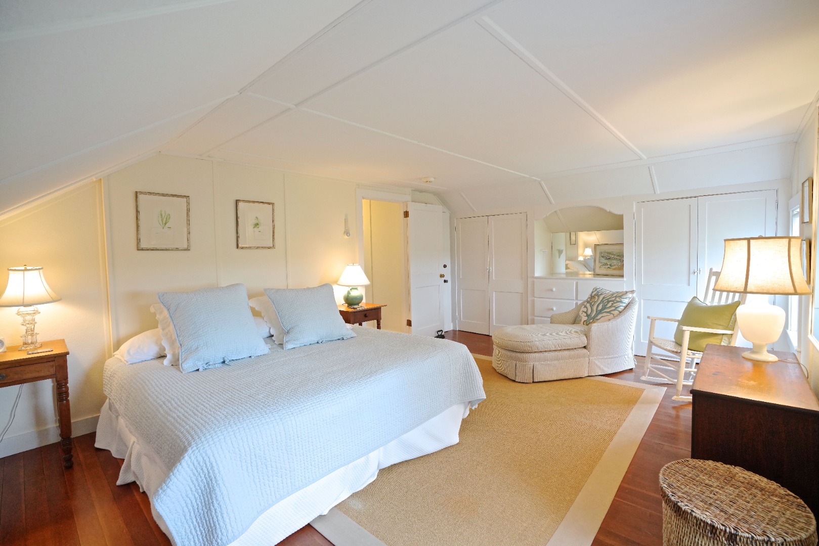 31 Butler's Cove Road Edgartown, MA 02539 - Photo 9 of 24 a bedroom with a bed and wooden floor