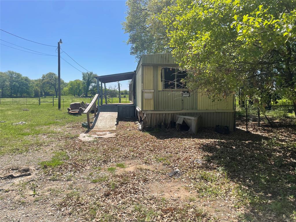 689 James Kemp, TX 75143 - Photo 3 of 6 a view of a garden with a slide