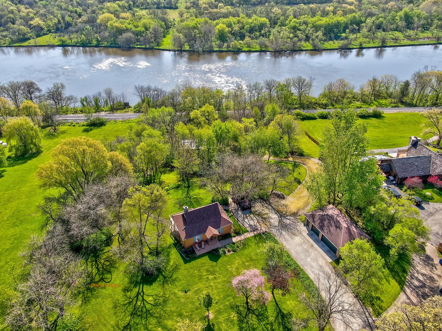1985 North 3189th Road Ottawa, IL 61350 - Photo 2 of 30 an aerial view of a house with a yard and lake view