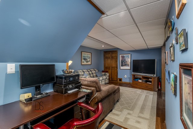 1985 North 3189th Road Ottawa, IL 61350 - Photo 20 of 30 a living room with furniture and a flat screen tv