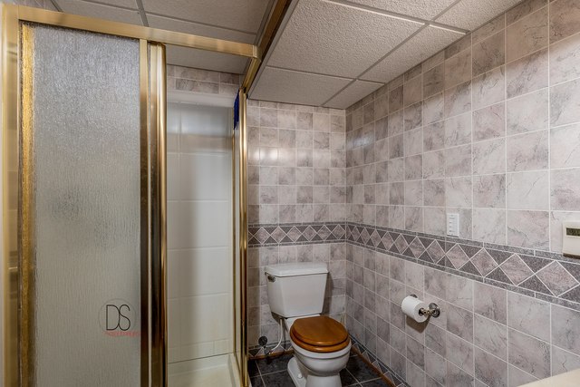 1985 North 3189th Road Ottawa, IL 61350 - Photo 22 of 30 a bathroom with a shower and a toilet