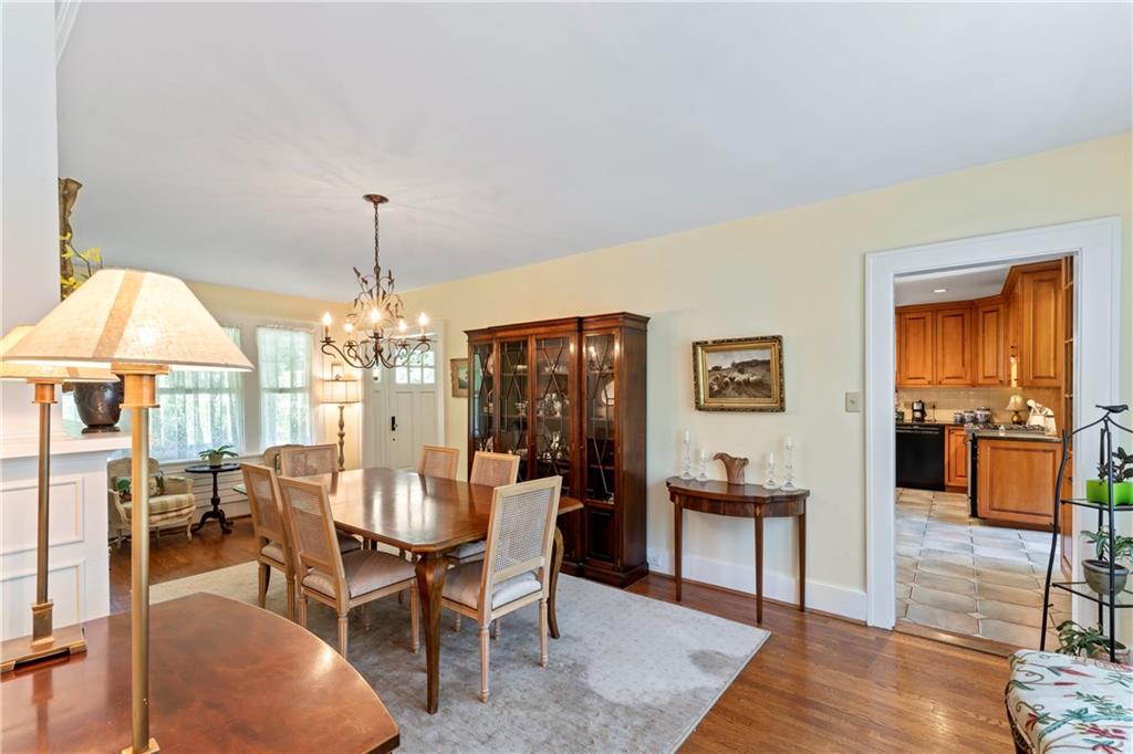 566 Dorseyville Road Pittsburgh, PA 15238 - Photo 14 of 48 a dining room with furniture a chandelier and wooden floor