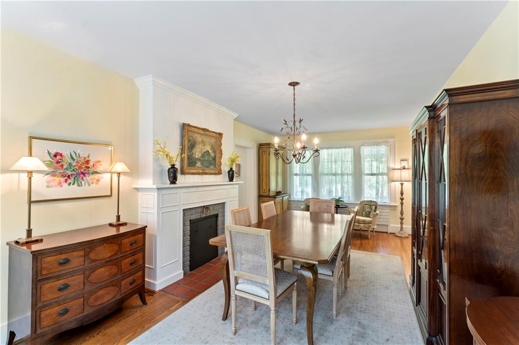 566 Dorseyville Road Pittsburgh, PA 15238 - Photo 16 of 48 a view of a dining room with furniture window and fire place