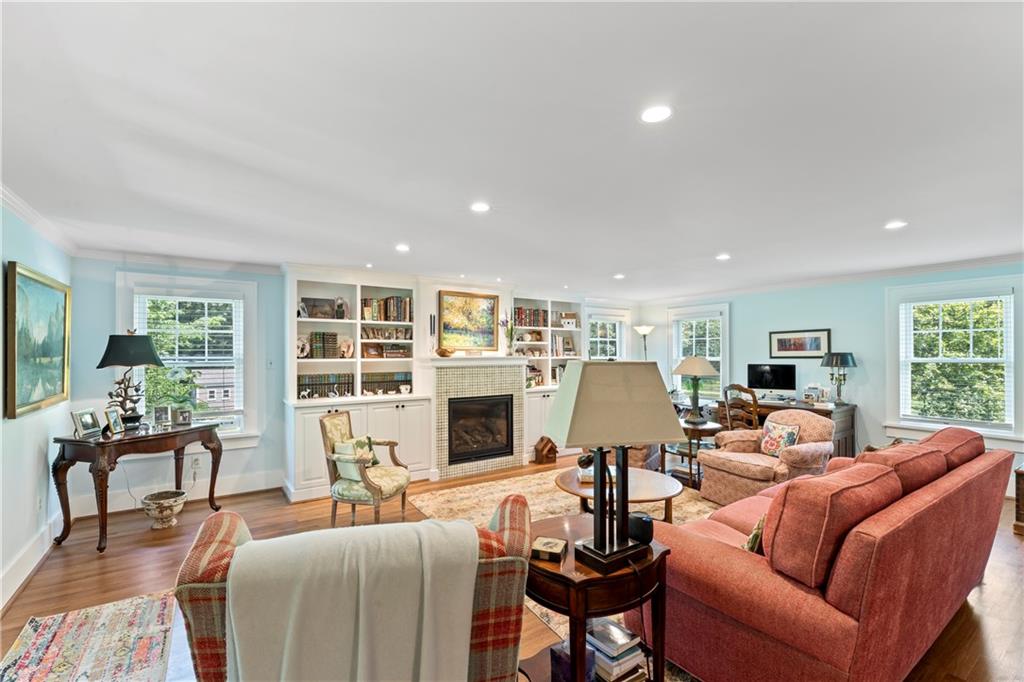566 Dorseyville Road Pittsburgh, PA 15238 - Photo 18 of 48 a living room with furniture floor to ceiling window and a flat screen tv