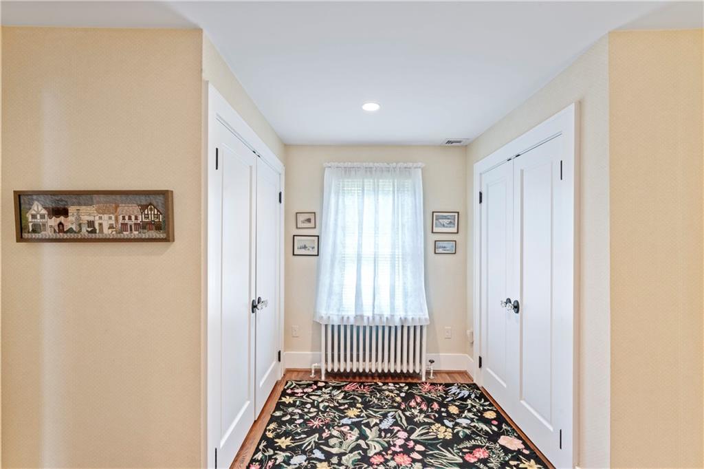 566 Dorseyville Road Pittsburgh, PA 15238 - Photo 29 of 48 a view of a hallway with wooden floor and a bathroom