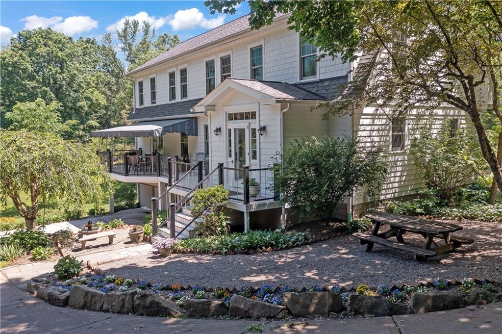 566 Dorseyville Road Pittsburgh, PA 15238 - Photo 42 of 48 a front view of a house with a yard