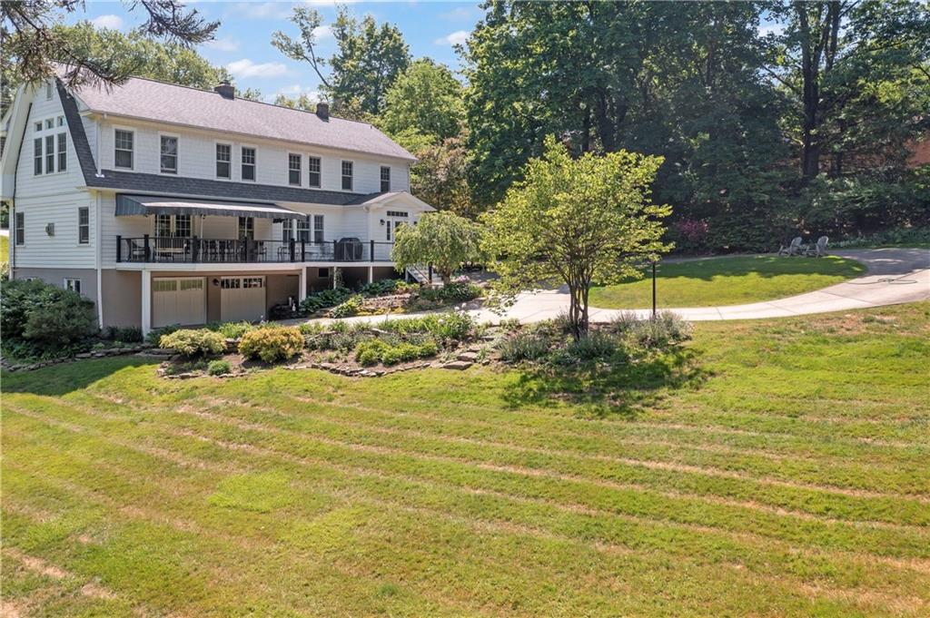 566 Dorseyville Road Pittsburgh, PA 15238 - Photo 44 of 48 a front view of a house with swimming pool and porch