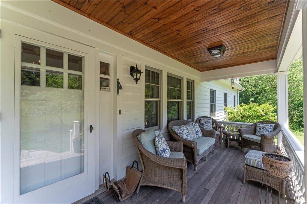 566 Dorseyville Road Pittsburgh, PA 15238 - Photo 6 of 48 a balcony with furniture and wooden floor