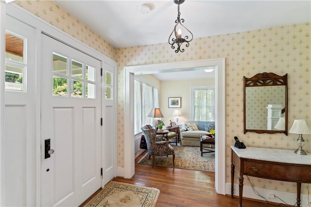 566 Dorseyville Road Pittsburgh, PA 15238 - Photo 7 of 48 a living room with furniture and a chandelier
