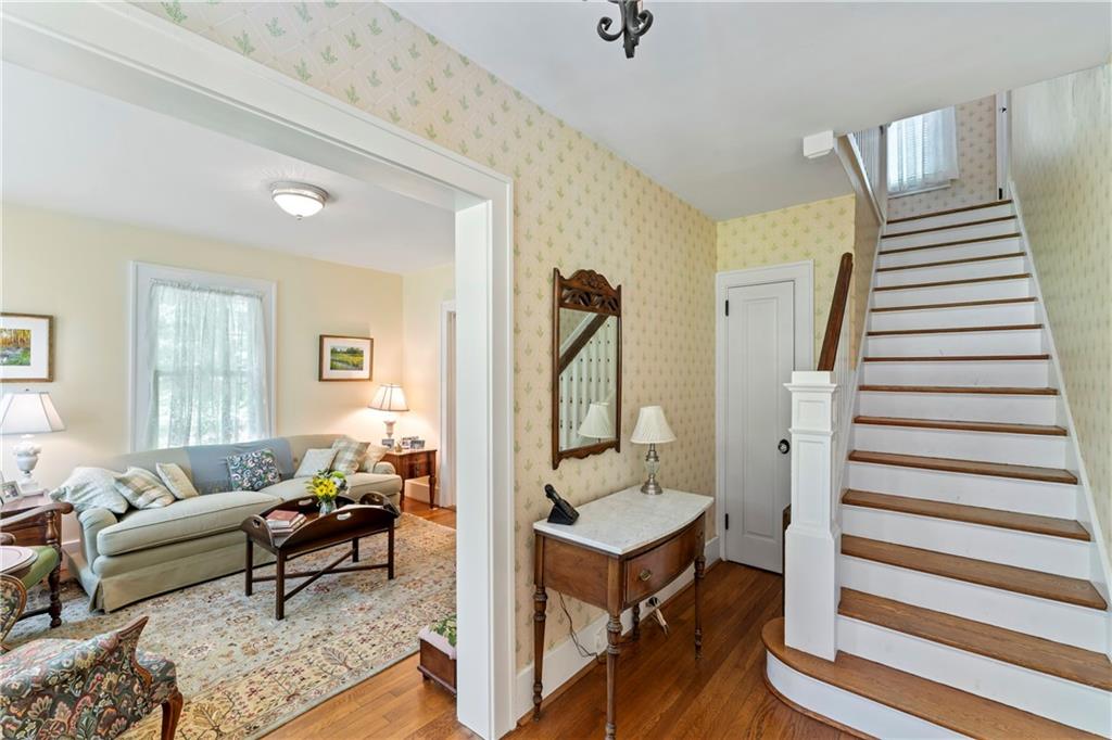 566 Dorseyville Road Pittsburgh, PA 15238 - Photo 8 of 48 a living room with furniture and a wooden floor