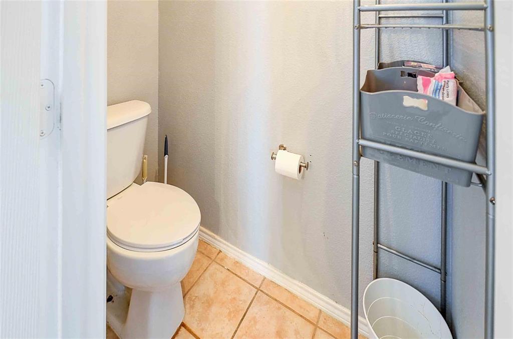 3609 Silverio Trail Bedford, TX 76021 - Photo 16 of 28 a bathroom with a sink toilet and vanity