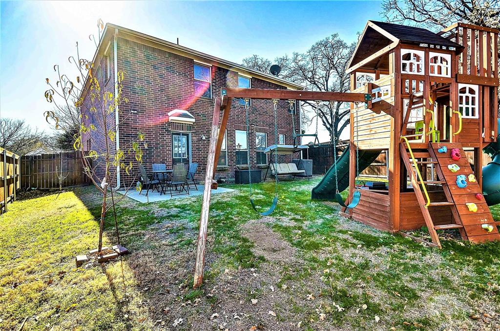 3609 Silverio Trail Bedford, TX 76021 - Photo 26 of 28 a view of a house with a yard