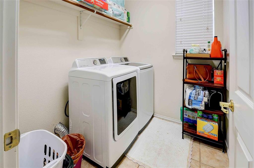 3609 Silverio Trail Bedford, TX 76021 - Photo 9 of 28 a utility room with dryer and washer