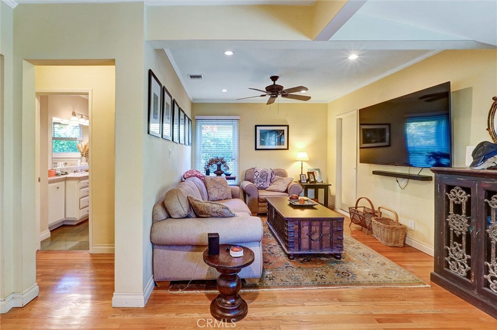 6649 Ranchito Avenue Van Nuys, CA 91405 - Photo 15 of 31 a living room with furniture and a flat screen tv