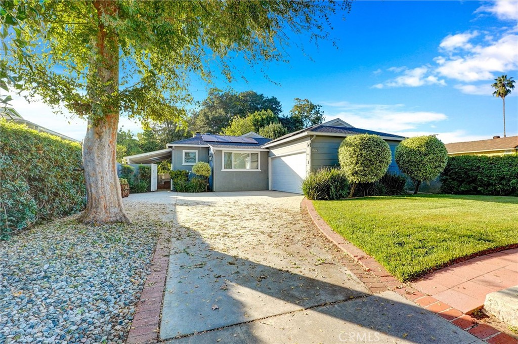 6649 Ranchito Avenue Van Nuys, CA 91405 - Photo 3 of 31 a front view of a house with garden
